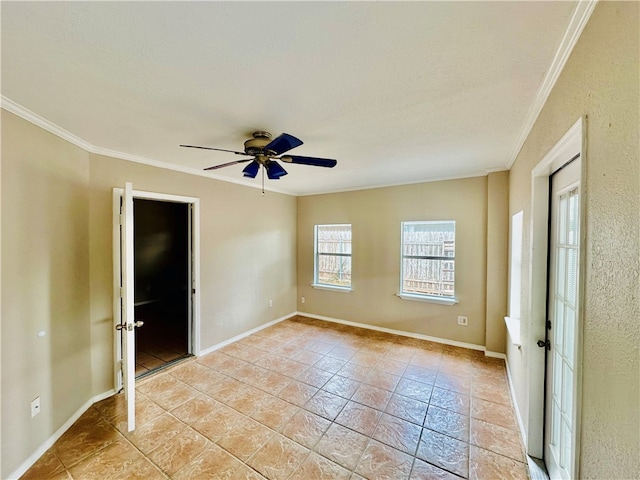 empty room with ceiling fan and ornamental molding