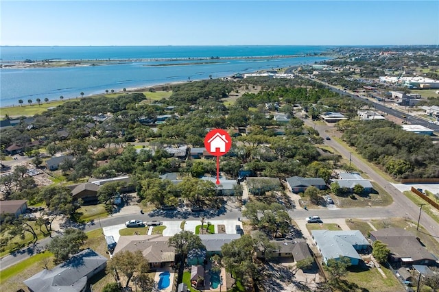 birds eye view of property featuring a water view