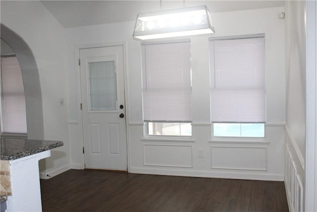 interior space featuring dark wood-type flooring