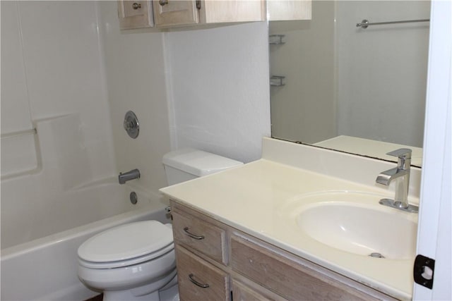 full bathroom featuring  shower combination, toilet, and vanity