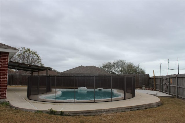 view of swimming pool with a pergola