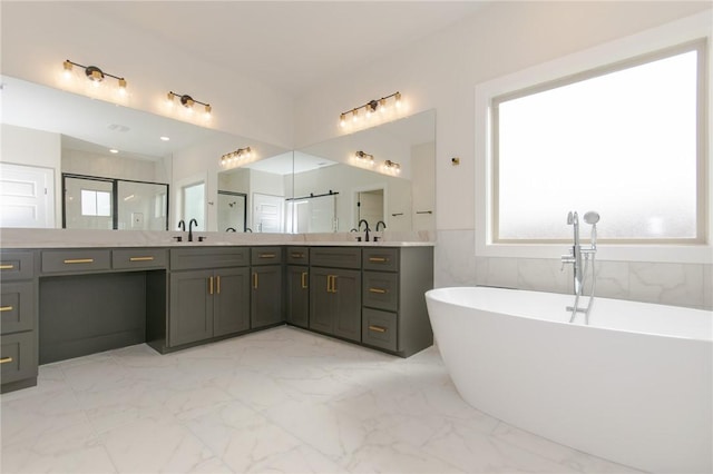 bathroom featuring vanity, plus walk in shower, and tile walls