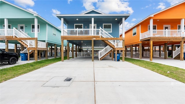 exterior space featuring a porch and a carport