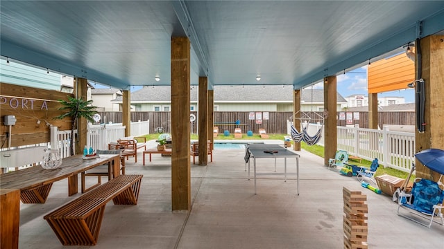 view of patio with a community pool