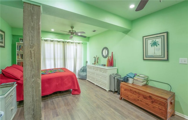 bedroom with visible vents, a ceiling fan, wood finished floors, and recessed lighting