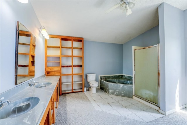 bathroom featuring a bath, tile patterned flooring, a sink, and a shower stall