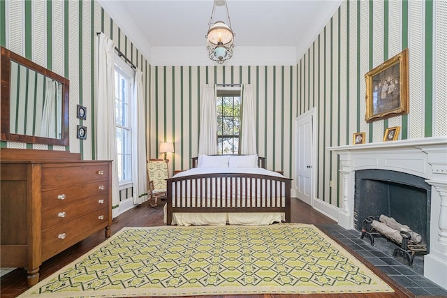 bedroom featuring dark hardwood / wood-style flooring