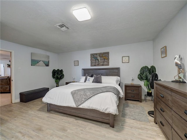 bedroom featuring light hardwood / wood-style floors