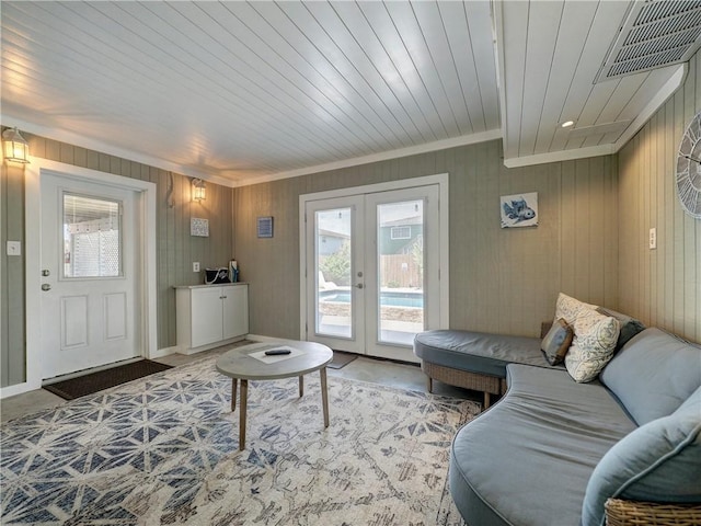 living room featuring wooden ceiling and french doors