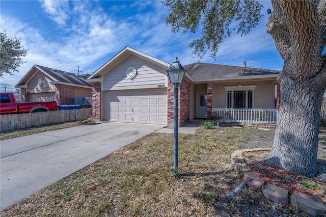 single story home featuring covered porch, brick siding, driveway, and an attached garage