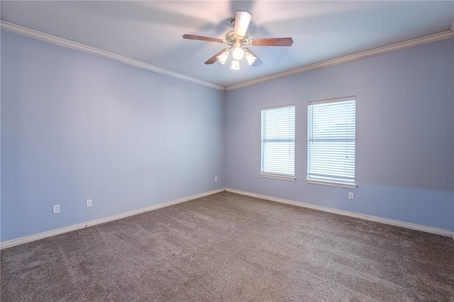 carpeted empty room featuring ceiling fan and ornamental molding