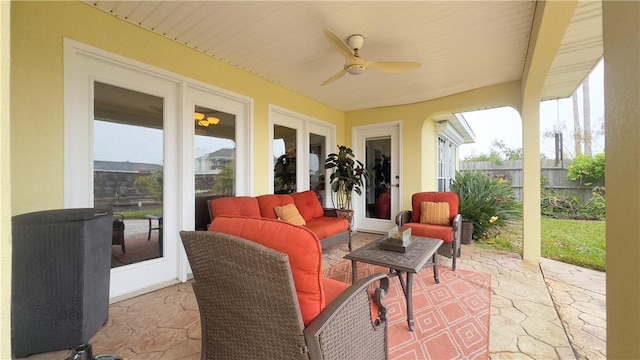 view of patio featuring ceiling fan, an outdoor hangout area, and french doors