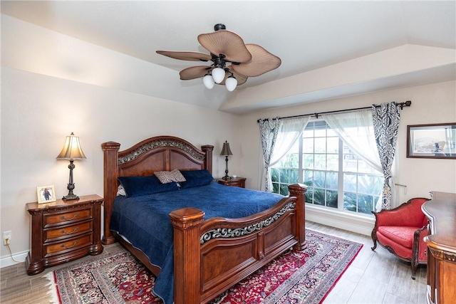 bedroom featuring ceiling fan and wood-type flooring