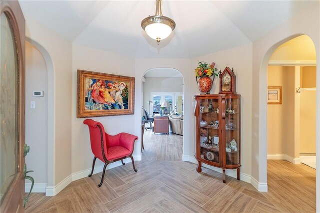 hallway with light parquet flooring