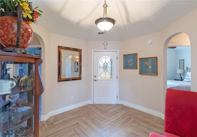 hall featuring light parquet flooring