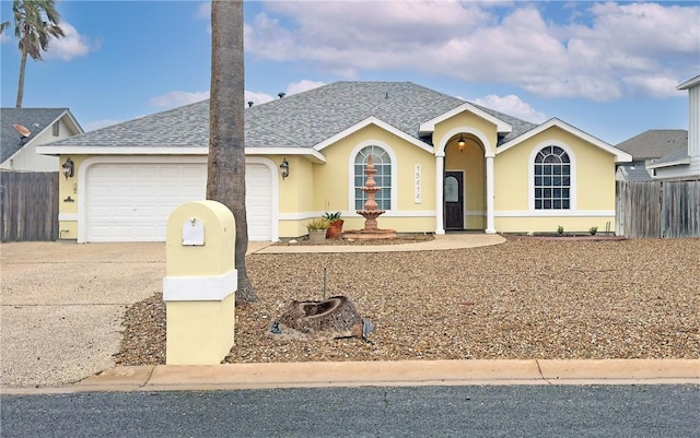 single story home featuring a garage