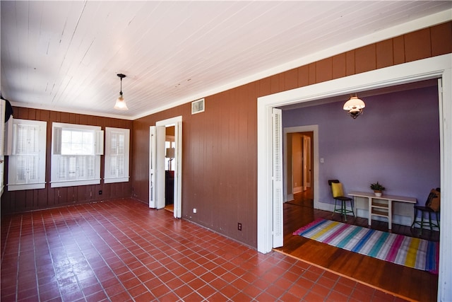 interior space featuring wood walls and wood-type flooring