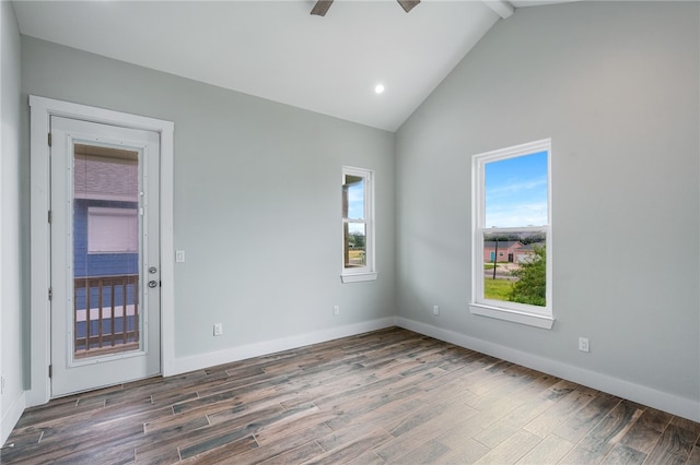 empty room featuring high vaulted ceiling, ceiling fan, and dark hardwood / wood-style floors