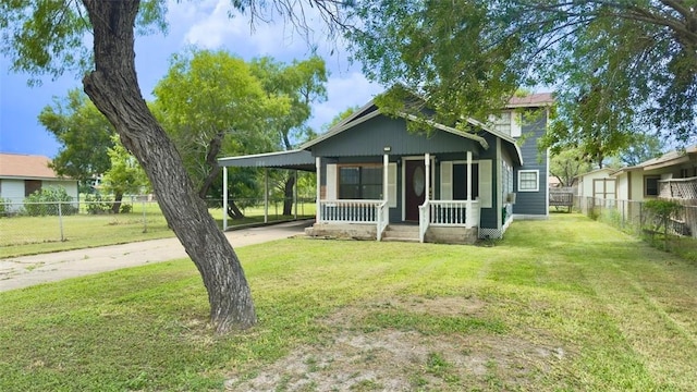 134 W C Ave, Kingsville, TX 78363 - view of front of home featuring a carport and concrete driveway