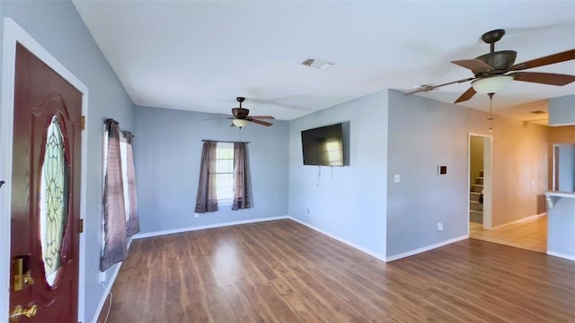 134 W C Ave, Kingsville, TX 78363 - spare room with a ceiling fan and wood finished floors