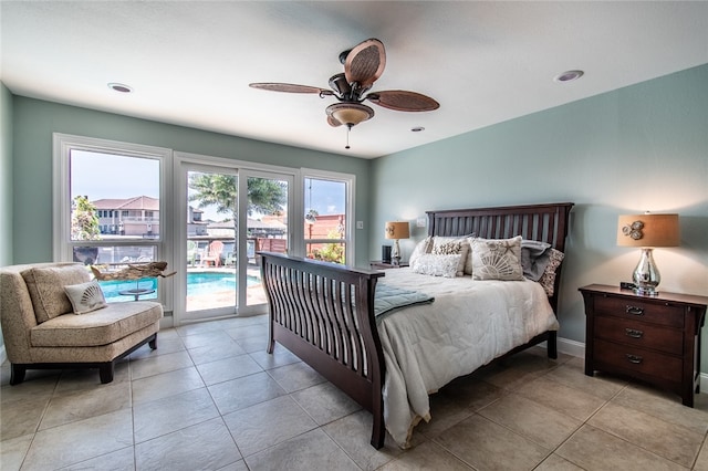 bedroom featuring access to outside, ceiling fan, and light tile patterned floors