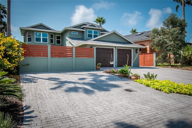 view of front of home with a garage