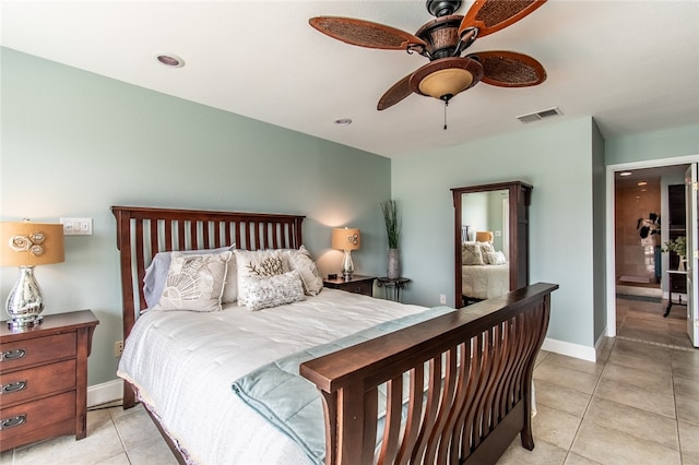 bedroom featuring light tile patterned flooring and ceiling fan