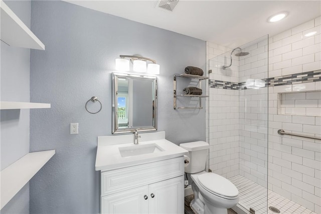 800 Beach Access Road 1a 804, Port Aransas, TX 78373 - bathroom featuring a shower stall, toilet, and vanity