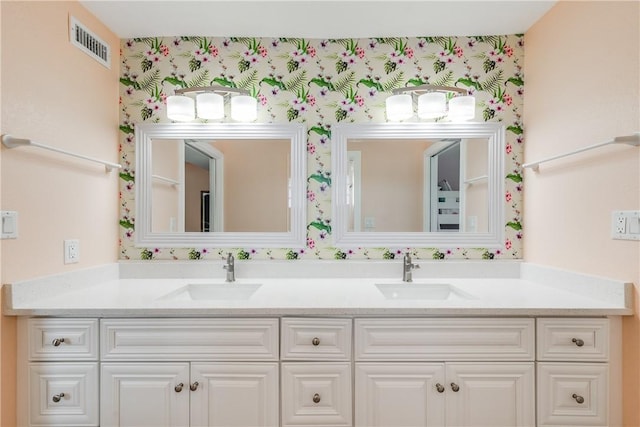 800 Beach Access Road 1a 804, Port Aransas, TX 78373 - bathroom with wallpapered walls and double vanity