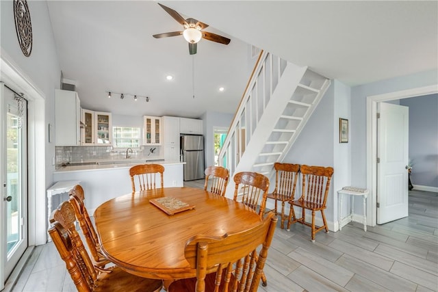 800 Beach Access Road 1a 804, Port Aransas, TX 78373 - dining area with a ceiling fan, stairway, baseboards, recessed lighting, and light wood finished floors