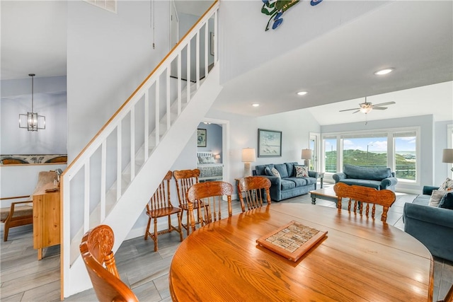 800 Beach Access Road 1a 804, Port Aransas, TX 78373 - dining area with ceiling fan, stairway, light wood-type flooring, recessed lighting, and lofted ceiling