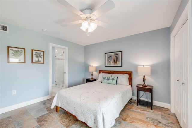 800 Beach Access Road 1a 804, Port Aransas, TX 78373 - bedroom featuring stone finish floors, a closet, baseboards, and ceiling fan