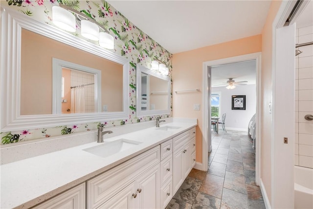 800 Beach Access Road 1a 804, Port Aransas, TX 78373 - full bath with double vanity, stone finish flooring, and baseboards