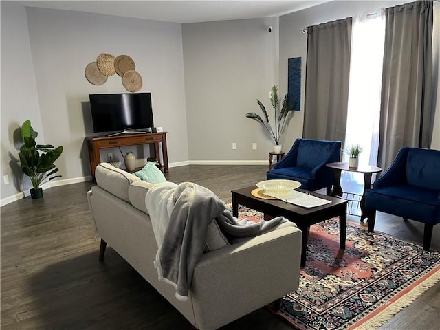 living room featuring dark hardwood / wood-style floors