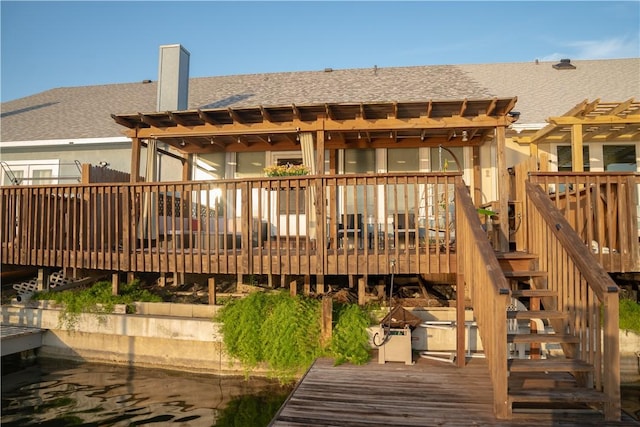 13902 Mingo Cay Ct, Corpus Christi, TX 78418 - back of house with stairs, a deck, roof with shingles, and a pergola