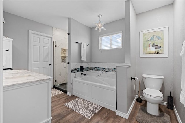 full bathroom featuring vanity, toilet, independent shower and bath, and hardwood / wood-style floors