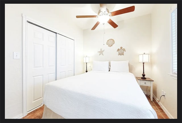 bedroom featuring a closet and ceiling fan