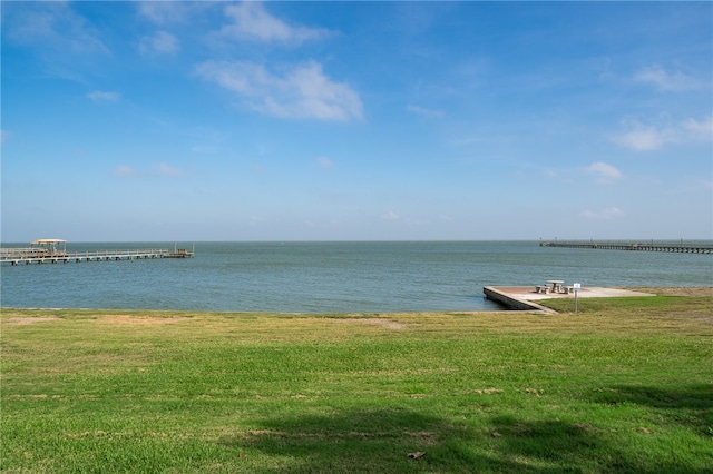 property view of water with a dock