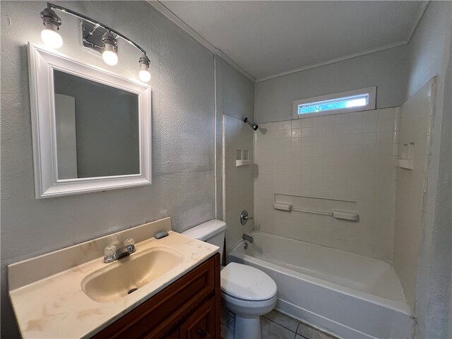 full bathroom featuring tile patterned floors, vanity, toilet, ornamental molding, and shower / bathtub combination