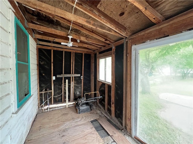 interior space featuring ceiling fan