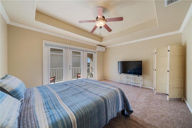 bedroom with a raised ceiling, ceiling fan, french doors, and an AC wall unit