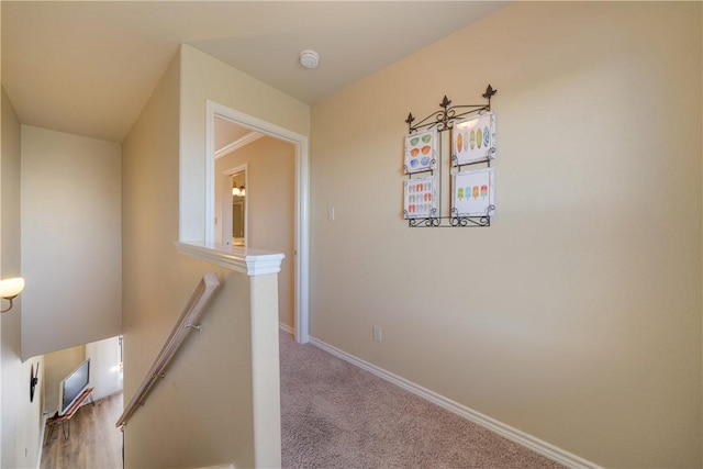 corridor featuring carpet flooring