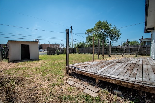 view of yard featuring a wooden deck