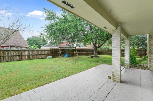 7617 Del Rio Dr, Corpus Christi, TX 78413 - fenced backyard featuring a patio area