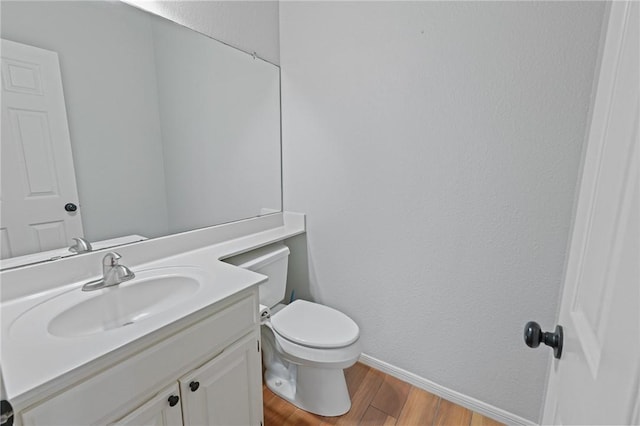 7617 Del Rio Dr, Corpus Christi, TX 78413 - half bathroom with wood finished floors and vanity
