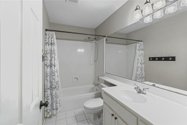 7617 Del Rio Dr, Corpus Christi, TX 78413 - full bath featuring shower / bath combination with curtain, vanity, tile patterned flooring, and a textured ceiling