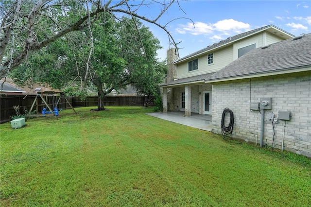 7617 Del Rio Dr, Corpus Christi, TX 78413 - fenced backyard featuring a patio area and a playground