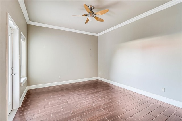 unfurnished room featuring hardwood / wood-style floors, ceiling fan, and crown molding