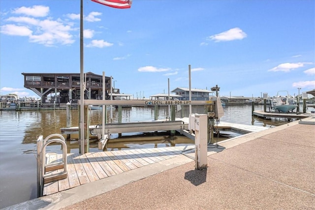 113 Bay Ct, Aransas Pass, TX 78336 - dock area featuring boat lift and a water view