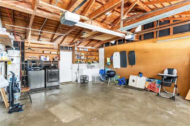 garage featuring a garage door opener and washing machine and dryer